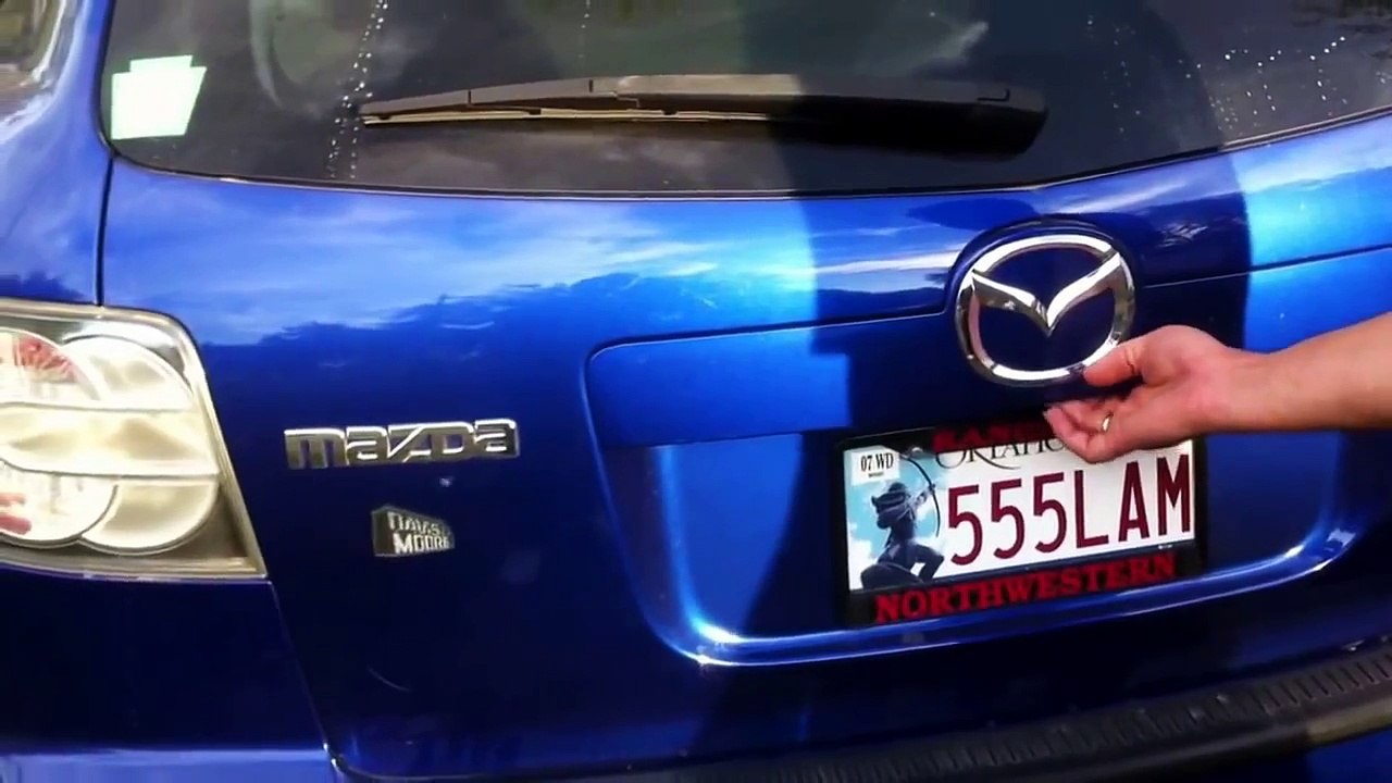 Mazda Cx-7 How to replace tail brake light reverse turn signal light bulb