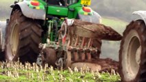 Ploughing with John Deere and New Holland.