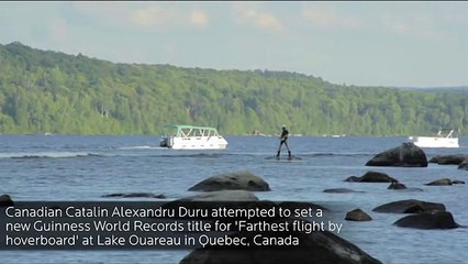 Guy hoverboards across a Canadian lake and into history
