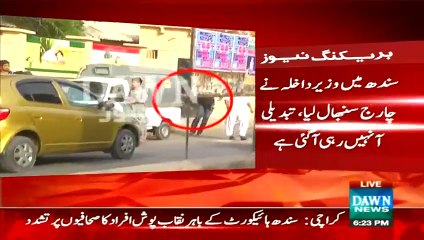 ▶ See how Sindh Police commando in mask beating cameraman outside SHC -