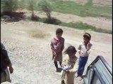 U.S. soldiers and Iraqi kids