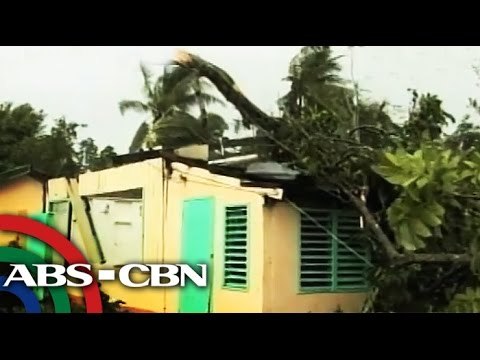 'Glenda' destroys houses in CamSur
