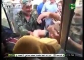 Syrian women beats captured terrorists by Syrian Arab Army