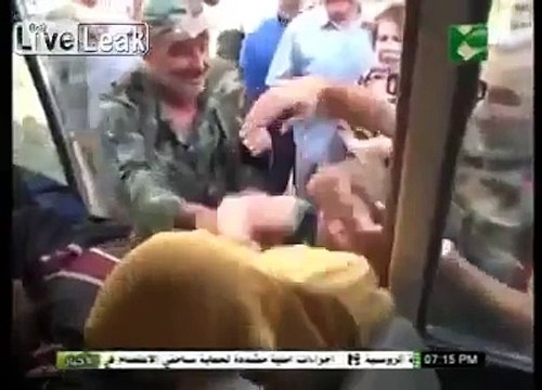 Syrian women beats captured terrorists by Syrian Arab Army