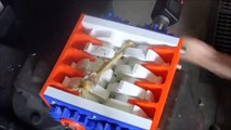 3D printed shredder shredding chicken bones