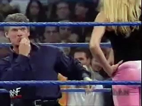 The rock and trish stratus make vince mcmahon kiss ass