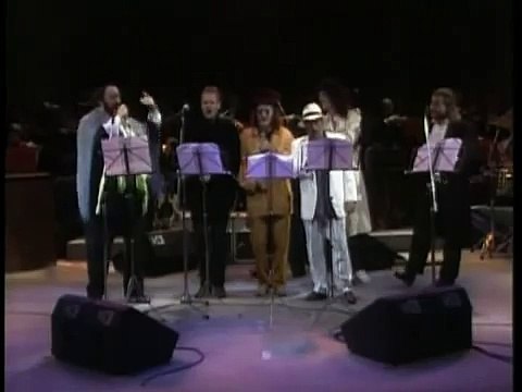 luciano pavarotti,sting y zuchero la donna e mobile