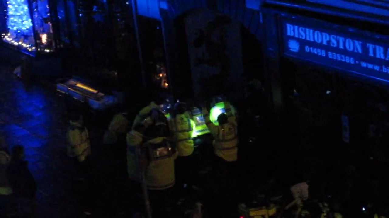 paramedics perform CPR on a heart attack victim