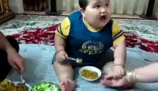 Don't touch....its my food-He fights for food....so cute