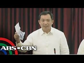 Militant lawmakers tear Edca paper during