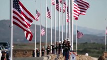 U.S. Marines with 3rd Marine Aircraft Wing (MAW) raise 50 National Flags