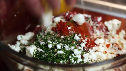 Aromatic lamb and feta meatballs on creamy potato gratin