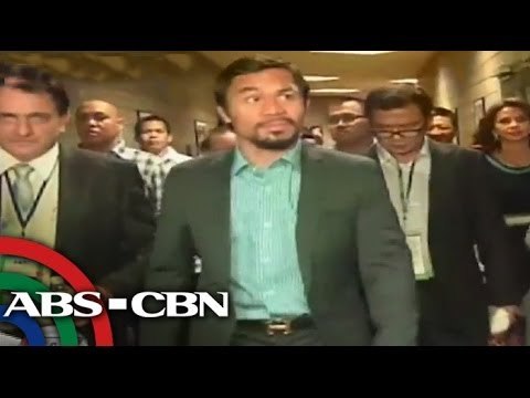 Manny Pacquiao regains his belt