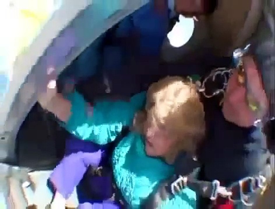 Sky Dive Fail-80 year old woman sky dive goes wrong, almost falls out of parachute plunges, HD