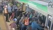 Passengers Tilt Train to Free Man Trapped in the Gap | Commuters Push Train To Free