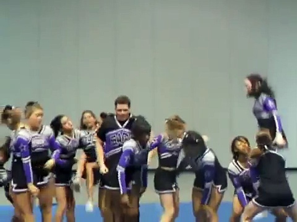 Fat male cheerleader dances