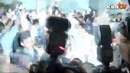 Anwar walks free... for now