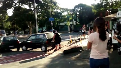 Strongman Literally Picks Up And Moves Car Parked In Bike Lane