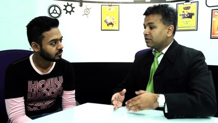 With the Residence Manager of Ramada Plaza Hotel