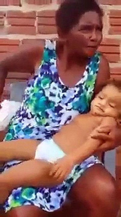 must see how woman feeding child