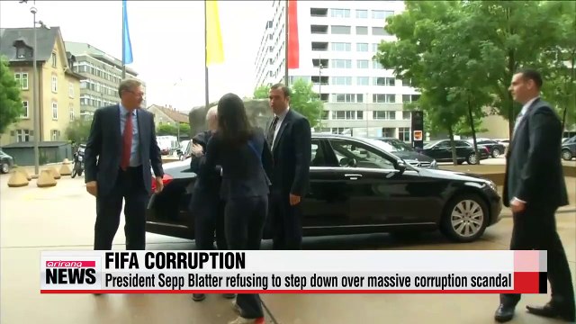FIFA President Sepp Blatter refusing to step down over massive corruption scandal