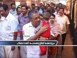 Pinarayi Vijayan with his grandson on CPI(m) historical exhibition