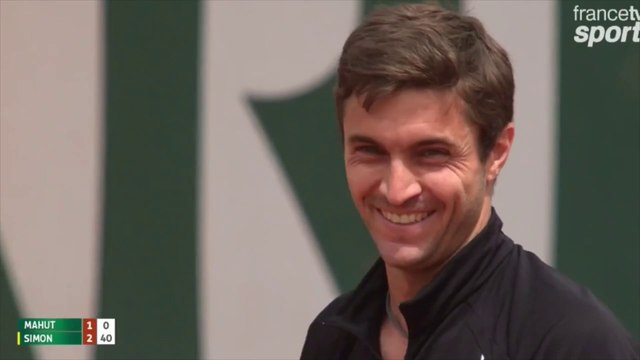La personne qui mange des chips lors de Nicolas Mahut - Gilles Simon