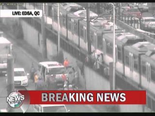 Man trapped under MRT coach