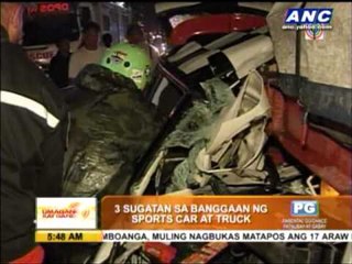 Mini Cooper crashes into truck; 3 critical