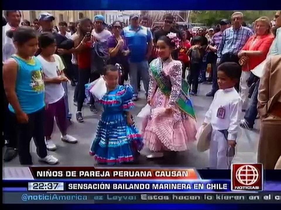 América Noticias - 310114 - Chile: niños de pareja peruana cautivan bailando marinera