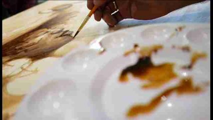 El arte del pintor del café impregna Miami con su aroma