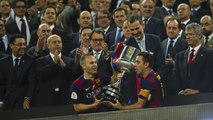INSIDE CUP CELEBRATION: Xavi and Iniesta receive the trophy