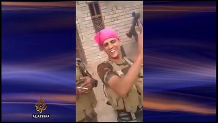 Iraq video purports to show Shia militia burning body