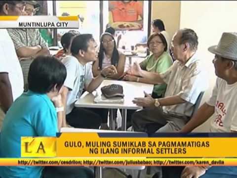 Informal settlers clash with cops in Muntinlupa