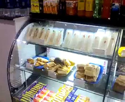 Mouse Eating restaurant food in Trivandrum Airport, Kerala, India