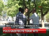 Gezi parkı eylemlerinin 2. yılında boşaltılan Gezi parkında polisten muhabire tokat