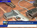 Aquino signs comprehensive gun control law