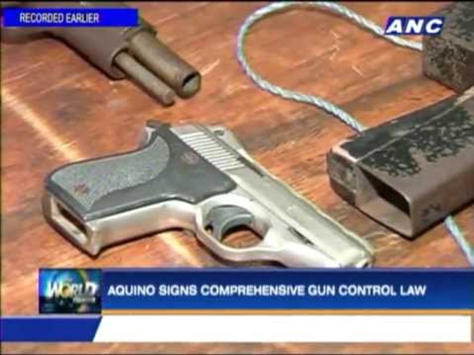 Aquino signs comprehensive gun control law