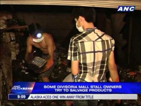 Divisoria Mall stall owners try to salvage products