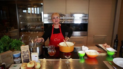 Lidia Bastianich cooking risotto to support the Duomo di Milano