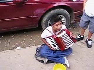 Amazing young singing street musician in Baja Mexico - "Tristes Recuerdos"
