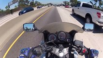Fast CHP LAPD Motorcycle Police Officer Splitting Lanes in Los Angeles