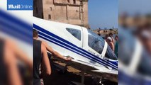 Holidaymakers narrow escape as plane crashes into Italian beach