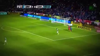 Ronaldinho steals the ball from the goalkeeper