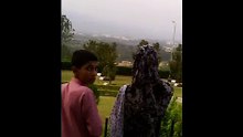 A FAMILY ENJOYING, IN SHAKAR PARRYAN, ISLAMABAD