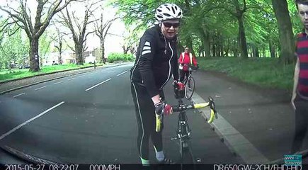 Biker Not Paying Attention Collides With Parked Car