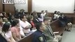 Police restraining teen in courtroom after being sentenced to Death.