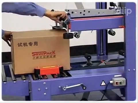 Máy dán thùng cartong FXJ 6050, máy dán băng dính băng keo hai mặt thùng carton