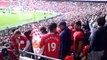 Manchester United fans singing Glory Glory at wembley .