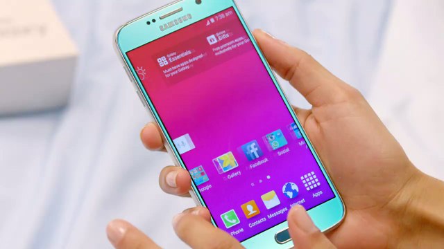 Unboxing it. Peeling off the plastic cover....